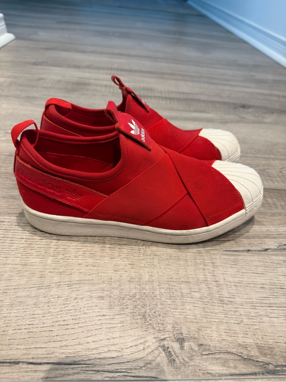 adidas Red Slip-On Shell Toe Sneakers with White Toe
